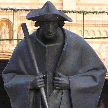 Brpnzestatue von Pilger mit Hut, Stab und Jakobsmuschel